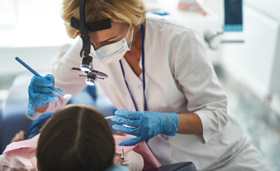 a patient during gum grafting surgery