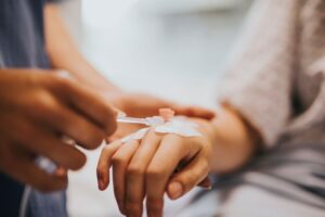 Patient receiving IV in their hand