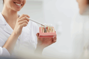a close-up of a dental implant model 